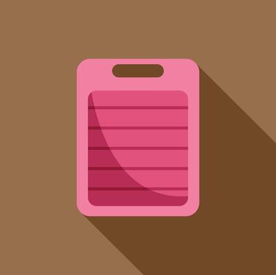 Pink cutting board with grooves resting on brown surface