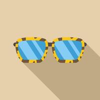 Stylish sunglasses with animal print frame lying on beige background vector