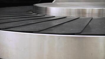 Moving empty baggage carousel at the airport video
