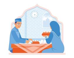 Muslim couple eating together at the dining table. Break the fast after a day of fasting. Ramadan Kareem concept. vector