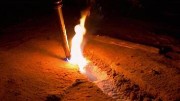 Burning Torch Moving Through Darkness with a Trail of Light video