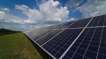 Solar panel on a modern station in a bright day. White clouds over the solar panel. Alternative clean electricity. Innovative technology to create renewable energy on a power plant. video