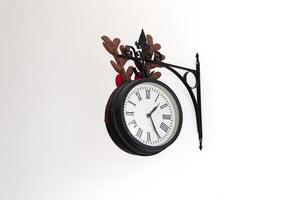 Old clock on white background. Horizontal photo