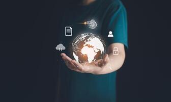 Ai, artificial intelligence technology for business connection and cyberspace communication network. Businessman hold virtual digital global on hand, virtual reality computer, generate big data cloud. photo