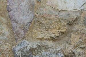 Marble fragments that are cut and pasted to create new patterns. photo