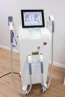 Advanced laser hair removal machine in a modern beauty clinic setting photo
