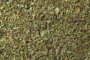 Dry Aromatic Herbs and Flavorful Spices Mix. A Culinary Canvas of Aroma Herb Seasoning. Textured Background for Gourmet Cooking. The Harmonious Combination of Dried Herbs and Spices - Top View photo
