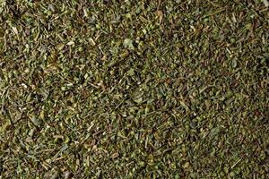 Dry Aromatic Herbs and Flavorful Spices Mix. A Culinary Canvas of Aroma Herb Seasoning. Textured Background for Gourmet Cooking. The Harmonious Combination of Dried Herbs and Spices - Top View photo