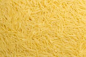 Uncooked Filini Pasta. A Culinary Canvas of Noodles, Creating a Lively and Textured Background for Gourmet Cooking. Dry Pasta. Raw Macaroni - Top View, Flat Lay photo