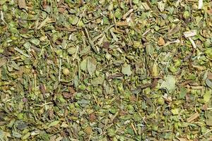 Dry Aromatic Herbs and Flavorful Spices Mix. A Culinary Canvas of Aroma Herb Seasoning. Textured Background for Gourmet Cooking. The Harmonious Combination of Dried Herbs and Spices - Top View photo