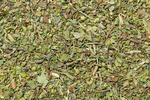Dry Aromatic Herbs and Flavorful Spices Mix. A Culinary Canvas of Aroma Herb Seasoning. Textured Background for Gourmet Cooking. The Harmonious Combination of Dried Herbs and Spices - Top View photo
