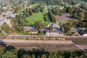 Aerial View of Botanical Garden with Adjacent Railway Station photo