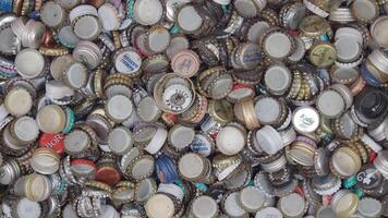 turkey istanbul 18 january 2024. Assorted bottle caps create a colorful background, ideal for beverage, beer, and soda designs video