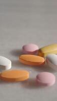An Array of Assorted Vitamins and Medications Displayed on a Bright white Surface video