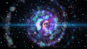 a bright galaxy made of billions of particles glows with neon and moves in space video