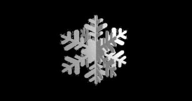Snowflake spinning. Three-dimensional white snowflake isolated on transparent background. Seamlessly looped, rotating 3D flake of snow video