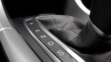 Switching the gear lever from sport mode to park mode. Shifting automatic transmission, close up video