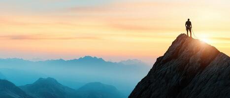 climber stands triumphantly on mountain peak at sunset, surrounded by vast landscapes. scene captures spirit of adventure and achievement in nature beauty photo