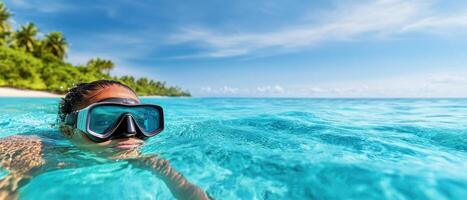 black traveler snorkeling in clear turquoise water, enjoying vibrant ocean. scene captures sense of adventure and relaxation under sunny sky photo