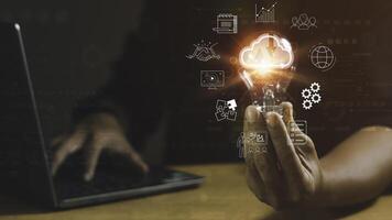 Businessman holding light bulb with global internet connection concept. Business global internet connection application technology and digital marketing, Financial and banking, big data photo