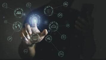 Man using mobile for digital transformation management, internet of things , new technology big data and business process strategy, automate operation, customer service management, cloud computing. photo