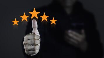 Satisfaction concept. Customer is using the service by mobile phone and give them a five-star satisfaction rating with copy space. photo