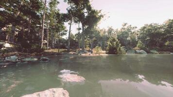 breathtaking mountain oasis, with a tranquil lake and fragrant pine forests video