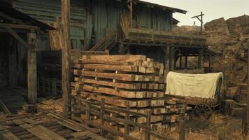 A stack of firewood next to a rustic building video