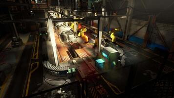 Machine building conveyor system in a factory with robotic arms working video