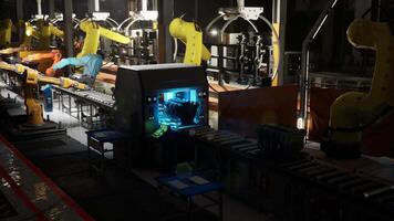 Automated conveyor belt operation in a modern factory during evening hours video