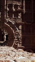 A large stone building with carvings on the side of it video