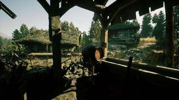 Rustic wooden structure with a barrel overlooking a serene landscape video