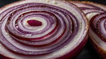 Close-up of a sliced red onion showcasing its layered structure and vibrant color. photo
