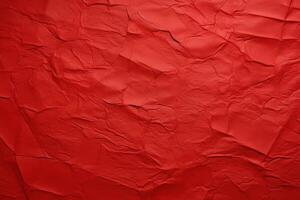 Crumpled red paper texture background photo