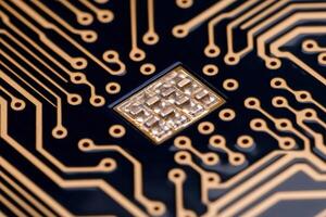 Close up of a complex circuit board with electronic components photo