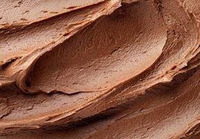 Smooth chocolate frosting texture photo