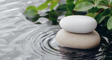 Tranquil zen garden with stacked stones and rippling water photo