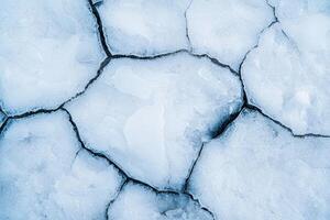 Cracked ice texture background photo