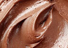 Smooth and creamy chocolate frosting texture photo