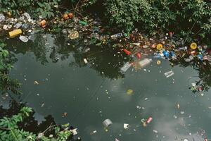 Polluted pond with plastic waste and debris photo