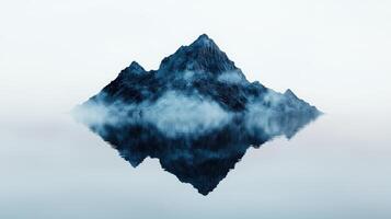 Majestic mountain peak reflected in still waters photo