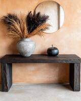 Autumn decor with dried floral arrangement and pumpkin photo