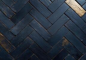 Textured black slate tiles in a herringbone pattern photo