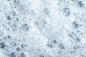 Sparkling water droplets on a surface photo