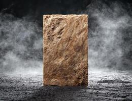Rugged stone block in misty atmosphere photo