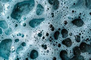 Closeup of bubbles in teal liquid photo