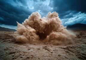 Dramatic explosion of dust and debris in a desert landscape photo