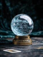 Mystical crystal ball on ornate stand photo