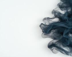 abstract smoke swirls on white background photo