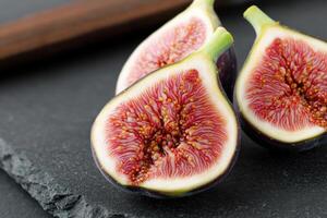 Sliced fresh fig with intricate patterns photo